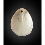 ABORIGINAL PENDANT, LONKA LONKA WESTERN AUSTRALIA carved pearl shell with incised decoration,
