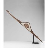 IATMUL SPEAR THROWER SEPIK RIVER, PAPUA NEW GUINEA carved wood and pigment, the shaft with incised