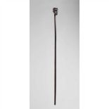 ZULU STAFF SOUTH AFRICA carved wood, long shaft terminating in a human head finial (Dimensions: 90.