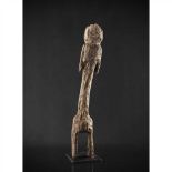 MOBA FIGURE TOGO carved wood, with long arms and torso, the figure is reduced to basic