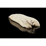 INUIT CRIBBAGE BOARD ARTIC carved bone, in the form of a polar bear lying prone with its paws