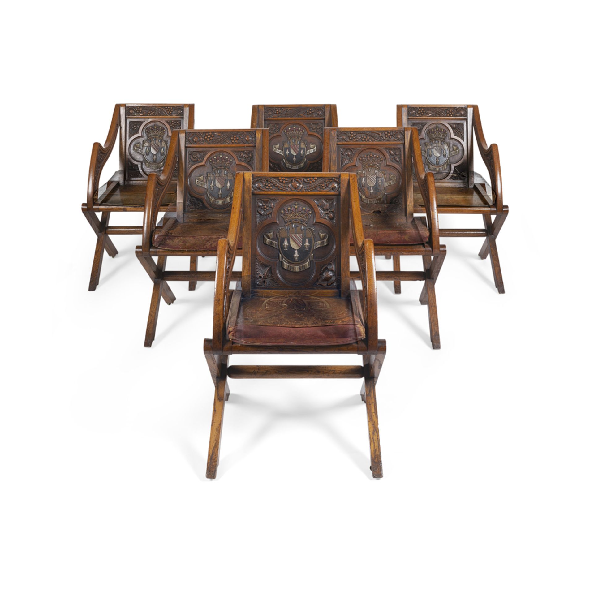 SET OF EIGHT EARLY VICTORIAN OAK AND POLYCHROME HERALDIC 'GLASTONBURY' CHAIRS, BEARING THE LOVELACE