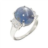 A star sapphire and diamond set ring