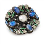An Arts and Crafts opal, mother-of-pearl and enamel brooch, attributed to Arthur and Georgie Gaskin,