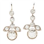 A pair of diamond pendant earrings