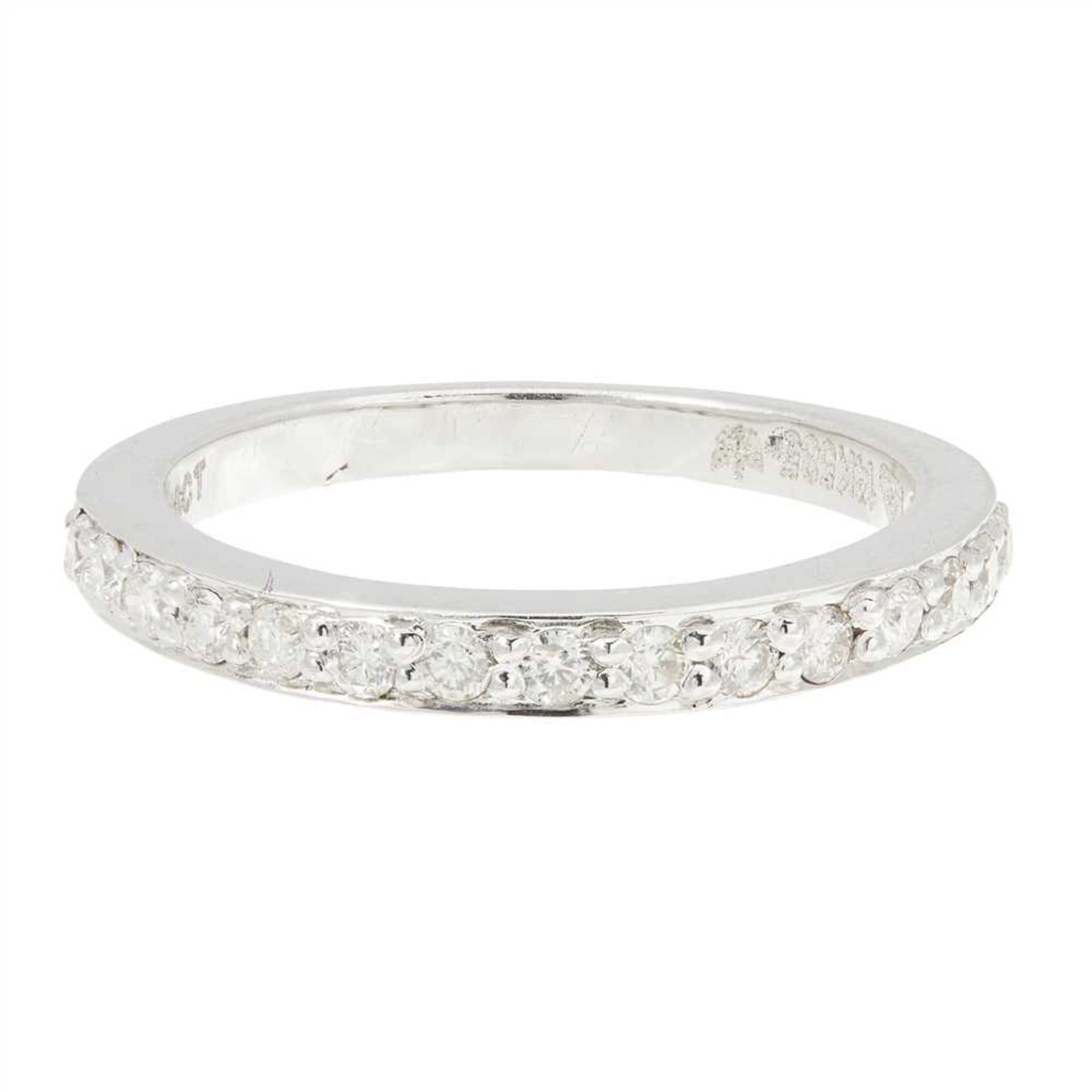 A diamond set half eternity ring