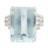 An aquamarine and diamond set ring