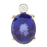 An 18ct gold Tanzanite and diamond set pendant