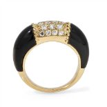 An onyx and diamond set ring