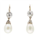 A pair of diamond and natural pearl set pendant earrings