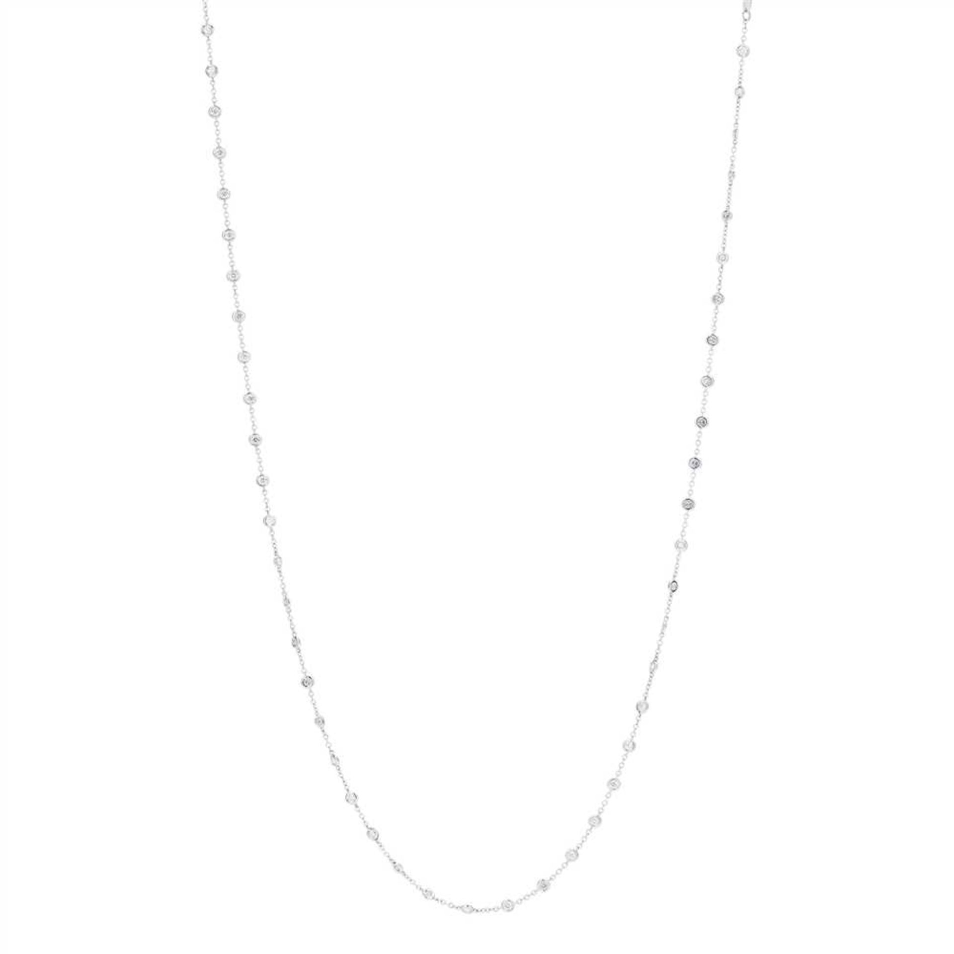 A diamond set long-chain necklace