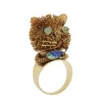 An enamelled ring in the form of a cat