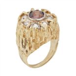 A 1970s brown zircon and diamond set ring