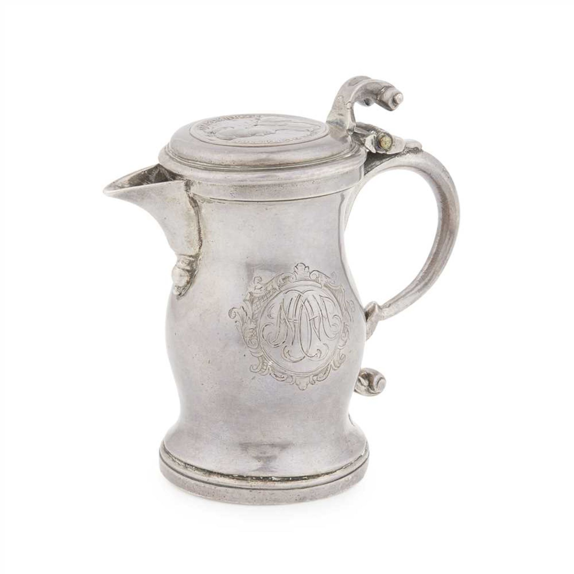 A small Britannia standard lidded jug