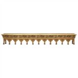 ENGLISH SCHOOL GOTHIC REVIVAL GILTWOOD AND GESSO CURTAIN PELMET, CIRCA 1880 the arcaded front with