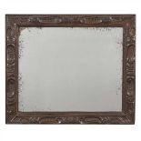 SCOTTISH SCHOOL PATINATED COPPER WALL MIRROR, CIRCA 1900 with rectangular frame repoussé-decorated