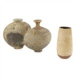 § JOANNA CONSTANTINIDIS (1927-2000) GROUP OF THREE STONEWARE VESSELS each with textured bodies and