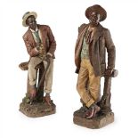 BERNHARD BLOCH TWO AUSTRIAN POLYCHROME DECORATED TERRACOTTA FIGURES, CIRCA 1890 both leaning on '