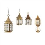 ENGLISH SCHOOL GROUP OF THREE ARTS & CRAFTS BRASS HANGING LANTERNS, CIRCA 1900 each with prism