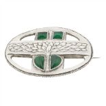 GERMAN SCHOOL JUGENDSTIL SILVER & GREEN CHALCEDONY OVAL BROOCH, CIRCA 1900 chased with a central