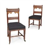 GEORGE EDMUND STREET (1824-1881) PAIR OF GOTHIC REVIVAL OAK SIDE CHAIRS, CIRCA 1860 the top rails