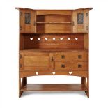BATH CABINETMAKERS ARTS & CRAFTS OAK DRESSER, CIRCA 1900 the superstructure with twin doors with