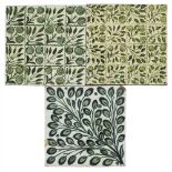 WILLIAM DE MORGAN (1839-1917) PAIR OF 'BERRIES & LEAVES' GREEN-GLAZED TILES, 1872-1881 one with