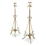 MANNER OF WILLIAM ARTHUR SMITH BENSON PAIR OF ARTS & CRAFTS BRASS EXTENDING STANDARD LAMPS, CIRCA