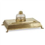 ATTRIBUTED TO HART, SON, PEARD & CO. GOTHIC REVIVAL BRASS INKSTAND, CIRCA 1880 with a glass