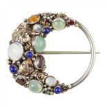 § ATTRIBUTED TO DORRIE NOSSITER ARTS & CRAFTS MULTI-GEM BROOCH, CIRCA 1920 set with cabochon