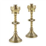 ENGLISH SCHOOL PAIR OF GOTHIC REVIVAL BRASS AND ENAMELLED CANDLESTICKS, CIRCA 1880 each with a