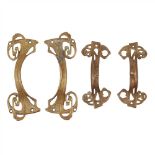 FRENCH SCHOOL TWO PAIRS OF ART NOUVEAU CAST BRONZE DOOR HANDLES, CIRCA 1900 each with cast