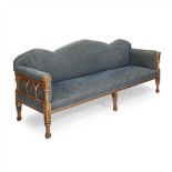 ENGLISH SCHOOL GOTHIC REVIVAL GILDED OAK SETTEE, CIRCA 1870 with upholstered back and seat, the
