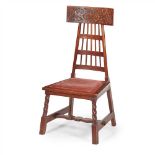 LIBERTY & CO., LONDON OAK SIDE CHAIR, CIRCA 1910 the curved blind fretwork top rail above spindle