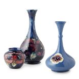 WILLIAM MOORCROFT (1872-1945) FOR MOORCROFT POTTERY GROUP OF THREE VASES, EARLY 20TH CENTURY