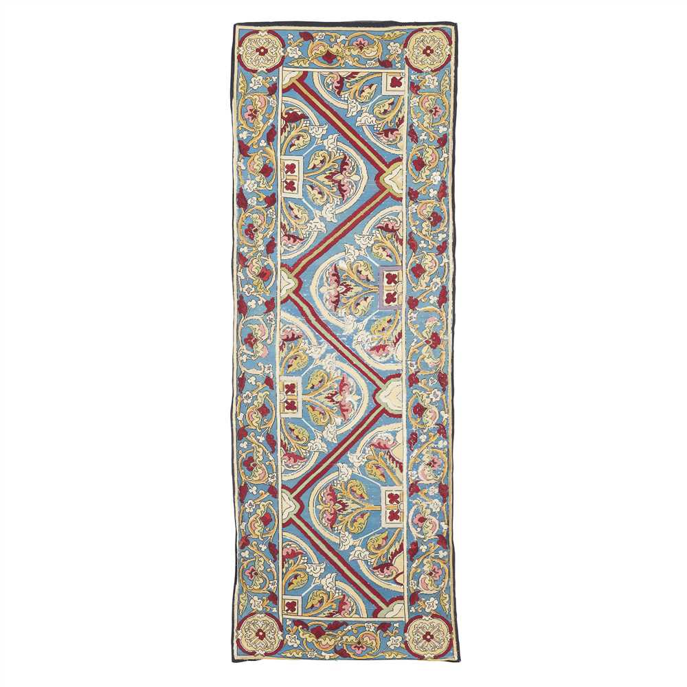 ENGLISH SCHOOL GOTHIC REVIVAL NEEDLEWORK CARPET RUNNER, CIRCA 1880 with repeat pattern of