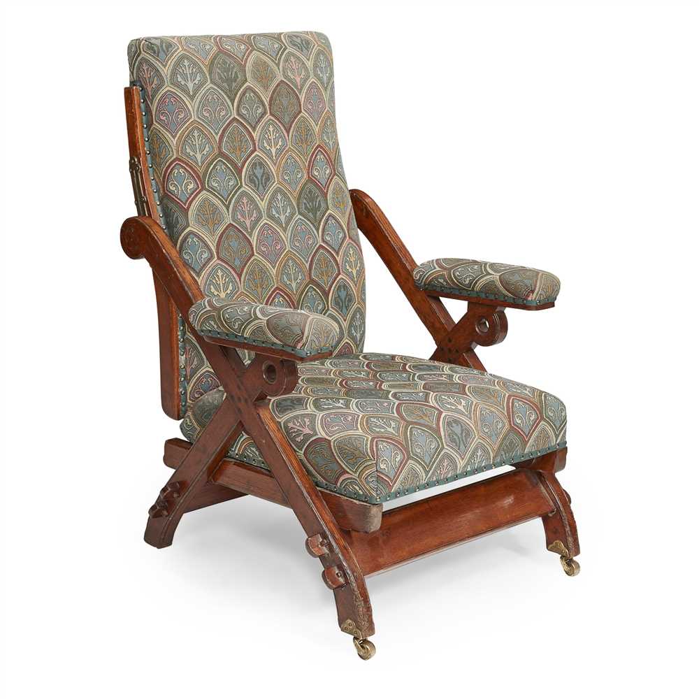 CHARLES BEVAN (fl. 1865-82) GOTHIC REVIVAL OAK ADJUSTABLE ARMCHAIR, CIRCA 1870 with later