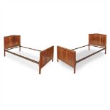 GORDON RUSSELL (1892-1980) PAIR OF WALNUT BEDS, CIRCA 1930 each with panelled head and footboard,