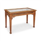 ENGLISH SCHOOL GOTHIC REVIVAL CARVED OAK BIJOUTERIE TABLE, CIRCA 1900 the hinged and glazed lid