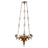 ENGLISH SCHOOL GOTHIC REVIVAL GILT BRASS CHANDELIER, CIRCA 1880 the pierced corona decorated with