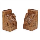 WORKSHOP OF ROBERT 'MOUSEMAN' THOMPSON PAIR OF OAK TRIPLE MICE BOOKENDS, CIRCA 1970 each carved with