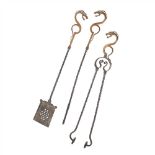 MANNER OF WILLIAM BURGES SET OF THREE GOTHIC REVIVAL FIRE IRONS, CIRCA 1880 wrought iron and