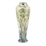 WILLIAM MOORCROFT (1872-1945) FOR JAMES MACINTYRE & CO. EARLY ‘IRIS’ FLORIAN WARE TAPERED VASE,