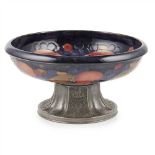 WILLIAM MOORCROFT (1872-1945) FOR LIBERTY & CO., LONDON ‘POMEGRANATE’ PEWTER MOUNTED TAZZA, CIRCA