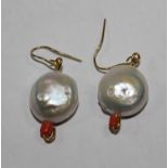 A pair of pearl and coral earrings