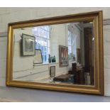 A giltwood cavetto moulded wall mirror with bevelled plate 75.5cm x 106cm