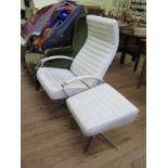 A 1970s cream leather and chrome lounge armchair and a matching footstool