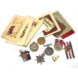 A collection of World War 1 and World War II medals, etc