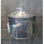 A silver on copper hexagonal tea caddy, with hinged beaded lid, 11cm high 10cm wide