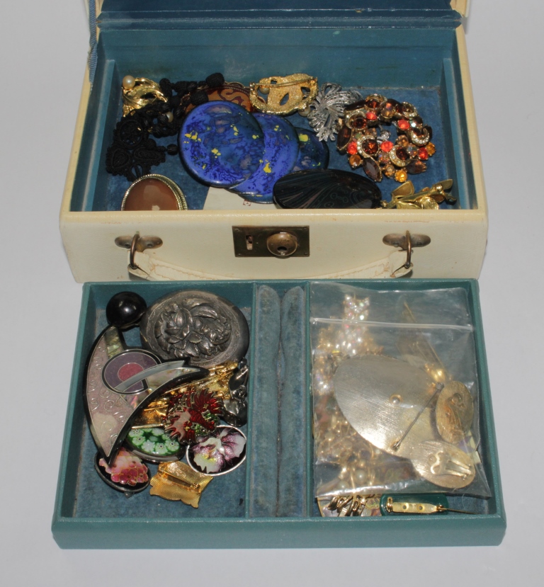 A jewellery case with costume jewellery